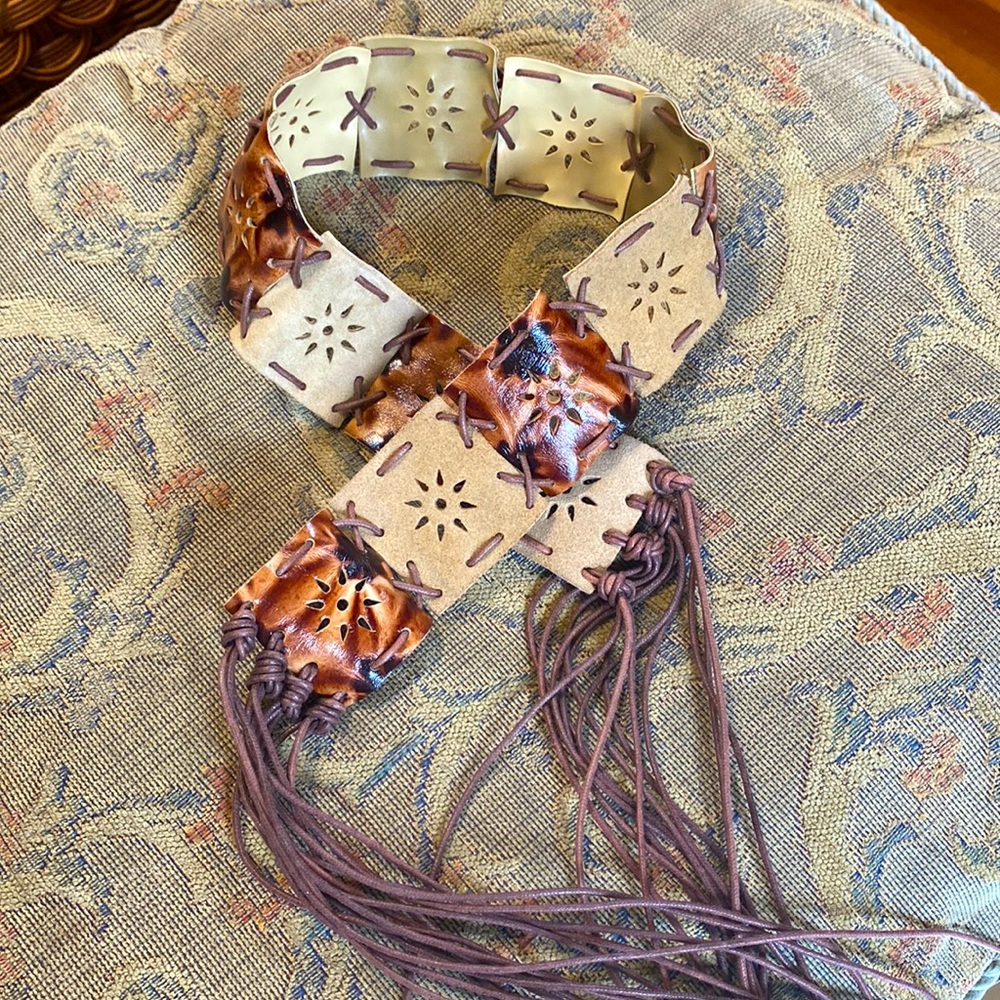 Cochella inspired . Western style belt with fringe and cut work details